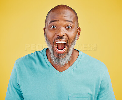 Buy stock photo Black man, portrait and surprise in studio, news and reaction for announcement on yellow background. Mature person, shock and wow for information or gossip revelation, omg and open mouth for rumor