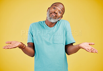 Buy stock photo Shrug, confused and portrait of black man in studio with opinion, question or lost in decision. Puzzled, doubt and frustrated mature person with uncertain gesture, idea or choice on yellow background