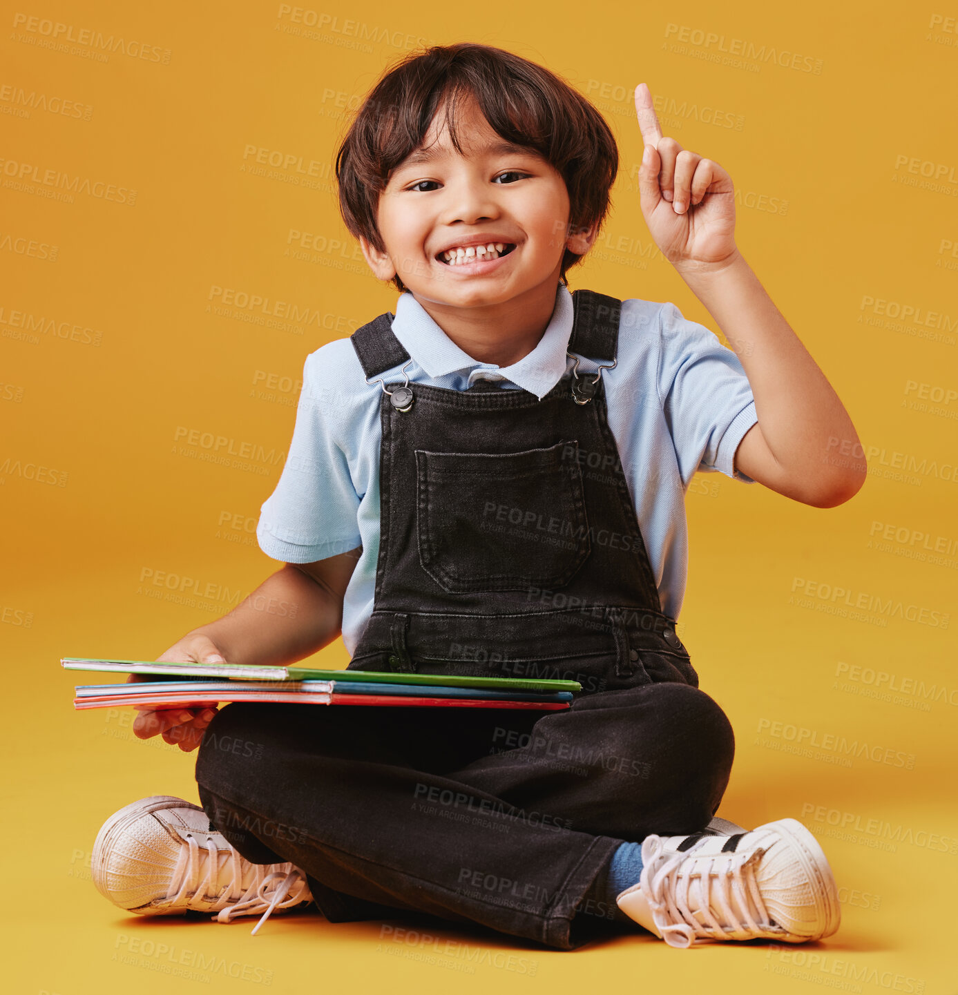 Buy stock photo Books, education and portrait of child with question in studio for studying with test for development. Scholarship, student and Asian kid with learn elementary school for future by yellow background.