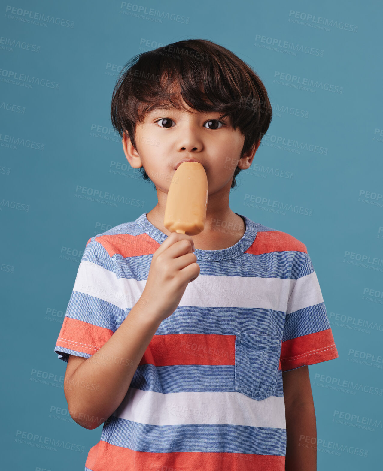 Buy stock photo Japanese boy, portrait and popsicle in studio background with sweet snack or sucker in Japan. Male person, kid and eating in confident with unhealthy food, dessert and treat with candy or ice cream