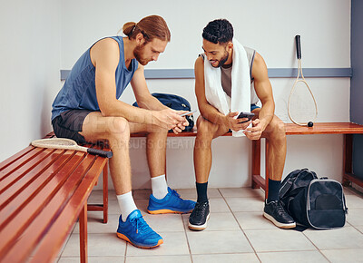 Buy stock photo Men, team and smartphone for sports, fitness and bonding in bathroom as collaboration and motivation. Athlete, mobile and workout video for squash, exercise and social media together in locker room