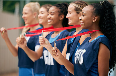 Buy stock photo Gold medal winner, netball team and women celebrate sports success, diversity and game win in competition together. Teamwork, support and athlete collaboration for sports victory performance