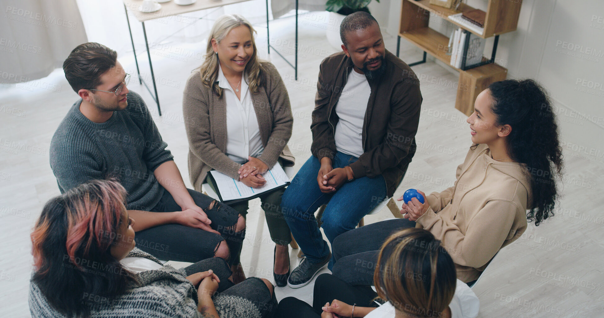 Buy stock photo Team building, therapy group and people in circle for mental health support, communication and counseling service in office. Diversity, community and trust group of people in psychology talk together