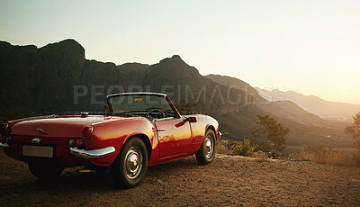 Buy stock photo Shot of a vintage car parked on the side of a mountain