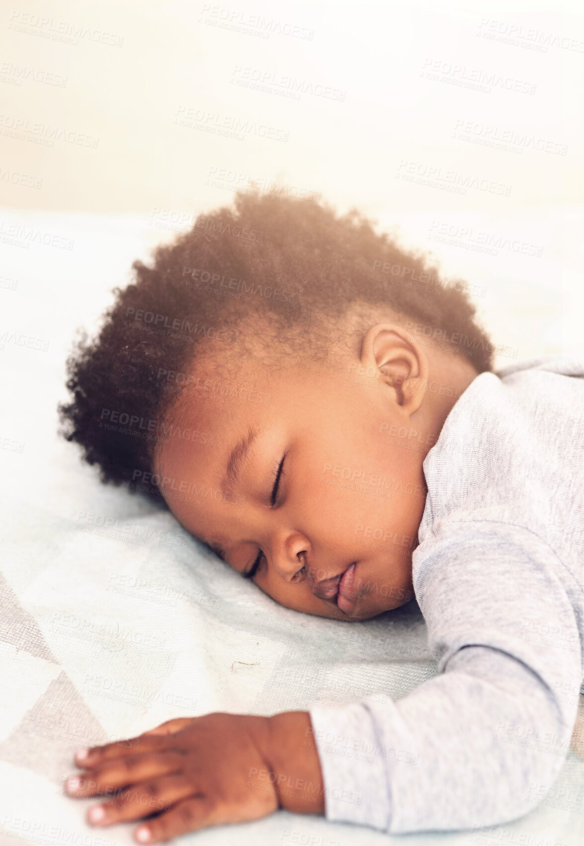 Buy stock photo Cute, bed and baby sleeping in home on blanket for rest, nap time and dreaming in nursery. Childcare, newborn and adorable, tired and African child in bedroom sleep for comfort, relaxing and calm