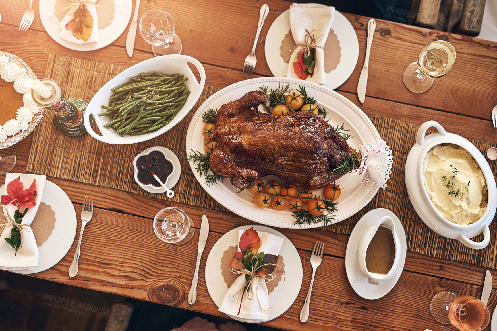 Buy stock photo Christmas lunch, top view and food on wood table of dining room for healthy meal, festive celebration and holiday event. Formal meal, roasted chicken and healthy thanksgiving dinner party at home