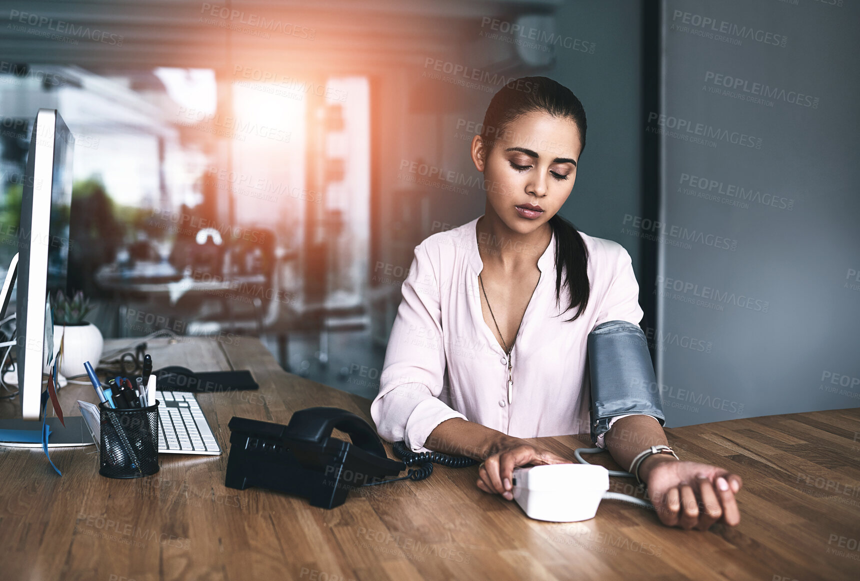 Buy stock photo Woman, monitor and blood pressure in office for healthcare, chronic disease and medical pump machine for hypertension. Work, stress management and cardiology, workplace and patient employee