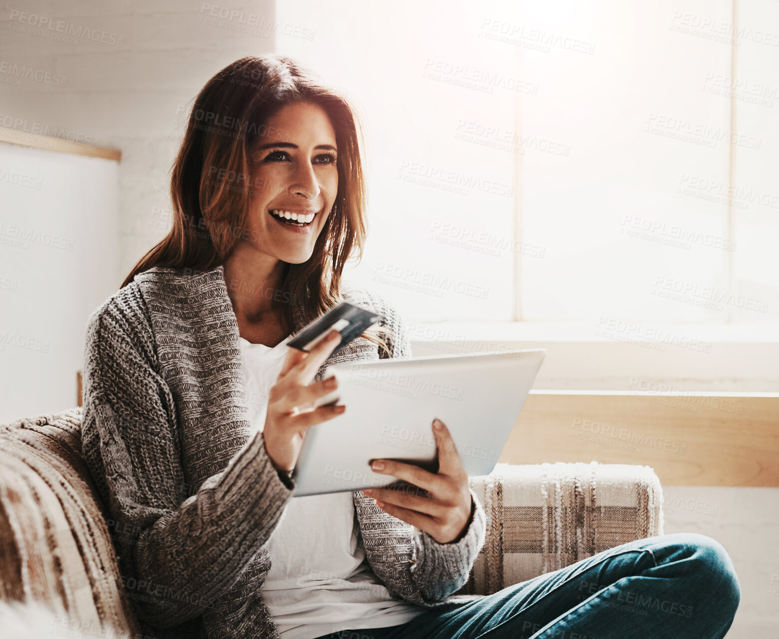 Buy stock photo Idea, tablet and credit card with a woman online shopping while sitting on a sofa in the living room at home. Ecommerce, finance and online banking with a young female customer thinking in her house