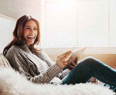 Buy stock photo Smile, tablet and credit card with a woman online shopping on a sofa in the living room of her home. Ecommerce, finance and fintech banking with a happy young female online customer in her house