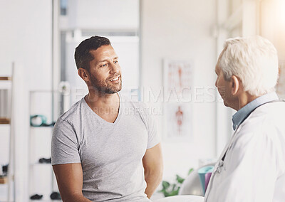 Buy stock photo Doctor, office and man with discussion in consultation for medical treatment, planning and feedback. Healthcare, people and mature professional with advice for physiatry, checkup and information