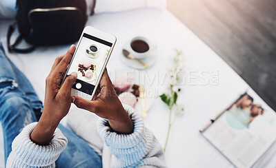 Buy stock photo Black woman hands, social media and photo for food blog with cake on hotel bed. Top, female person and screen of a freelance blogger with dessert, technology and vlog with entrepreneur in room