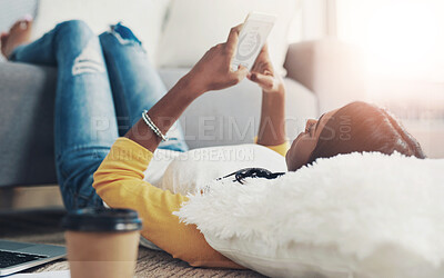 Buy stock photo Lounge floor, cellphone and relax woman typing, texting and search online for home info, media or news blog. Scroll, email and person on smartphone, digital research and message social network user