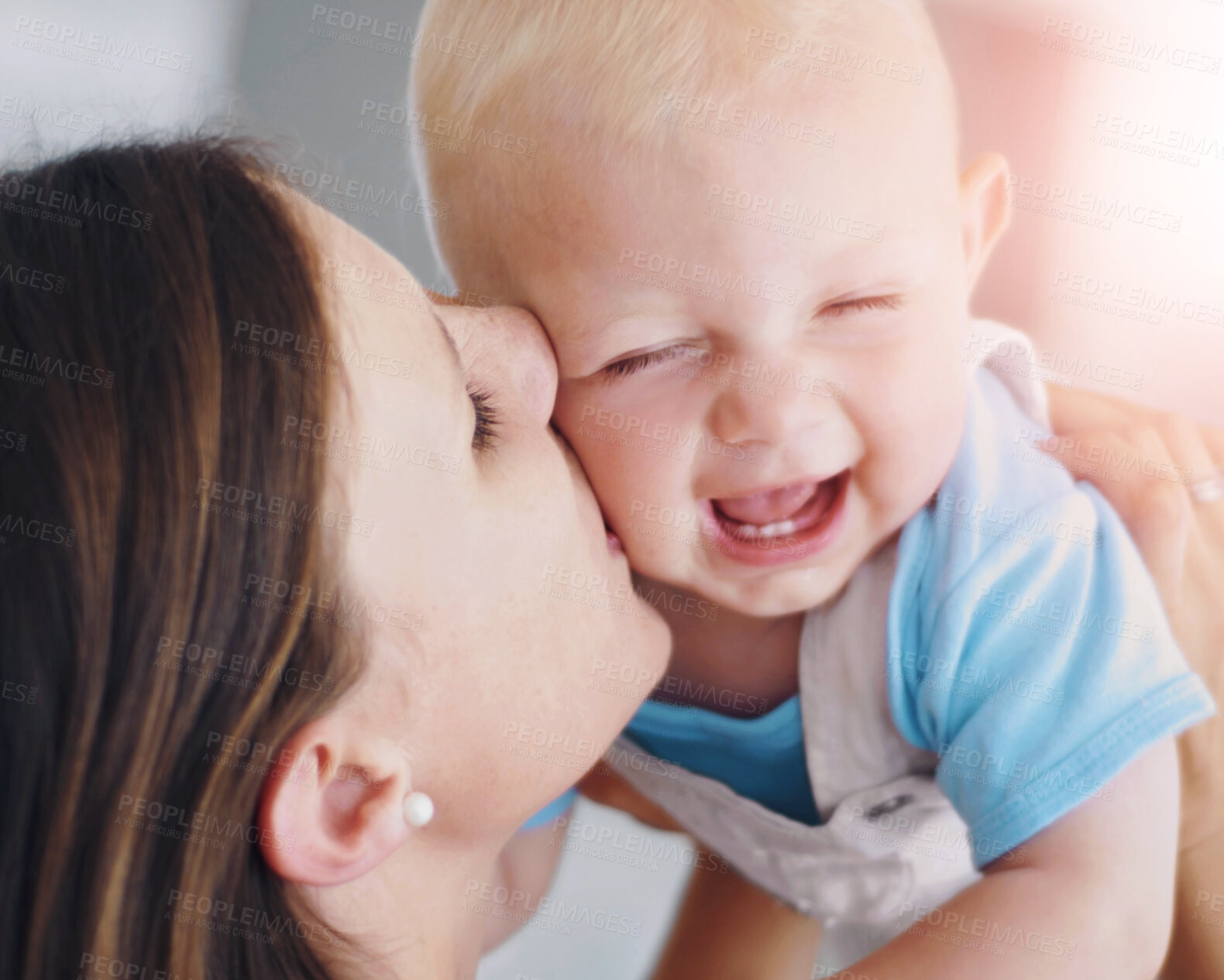 Buy stock photo Young beautiful mother holding her cute baby