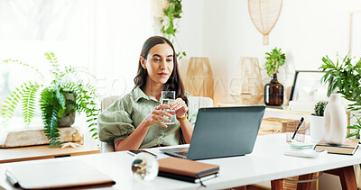 Buy stock photo Water, glass and woman at laptop in home office for research, review and business plan for freelance project. Remote work, relax and consultant at desk with drink, computer and reading online article