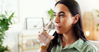 Buy stock photo Woman, thinking and drinking with water in glass for hydration, cleanse or refreshment at office. Young, female person or employee with mineral liquid or beverage for thirst or natural sustainability