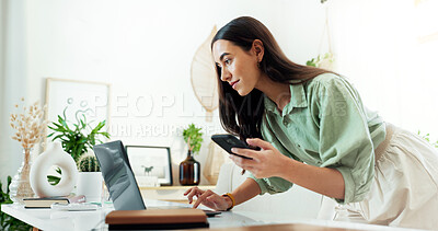 Buy stock photo Business, woman and laptop with phone in office for multitasking, reading email or checking notification. Professional, employee and digital technology at desk for proposal feedback or project review