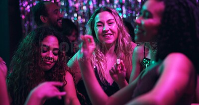 Buy stock photo Dancing, festive and friends in club, night and fun for women, bonding and celebration in weekend or group. Lights, dark and listening to music, dancer and people in rave, disco and smile in New Year