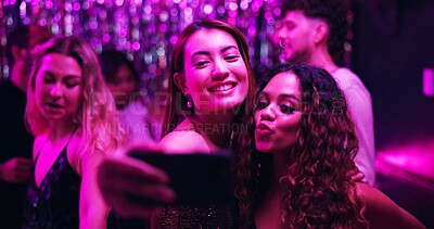 Buy stock photo Dancing, selfie and friends in club, night and fun for women, bonding and celebration in weekend or group. Photography, dark and memory of party, smile and profile picture of people, rave or New Year