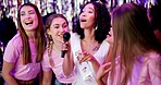 Woman, bride and sing with mic at party to celebrate engagement, future wedding and disco night at club. Excited, friends and funny event with bridal shower, marriage and ceremony for traditional
