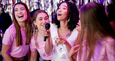 Buy stock photo Woman, bride and sing with mic at party to celebrate engagement, future wedding and disco night at club. Excited, friends and funny event with bridal shower, marriage and ceremony for traditional
