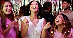 Bachelorette party, celebration and confetti with women at club for bride to be, wedding and night. Support, bridal shower and hen do with people for social event, friends and happiness together
