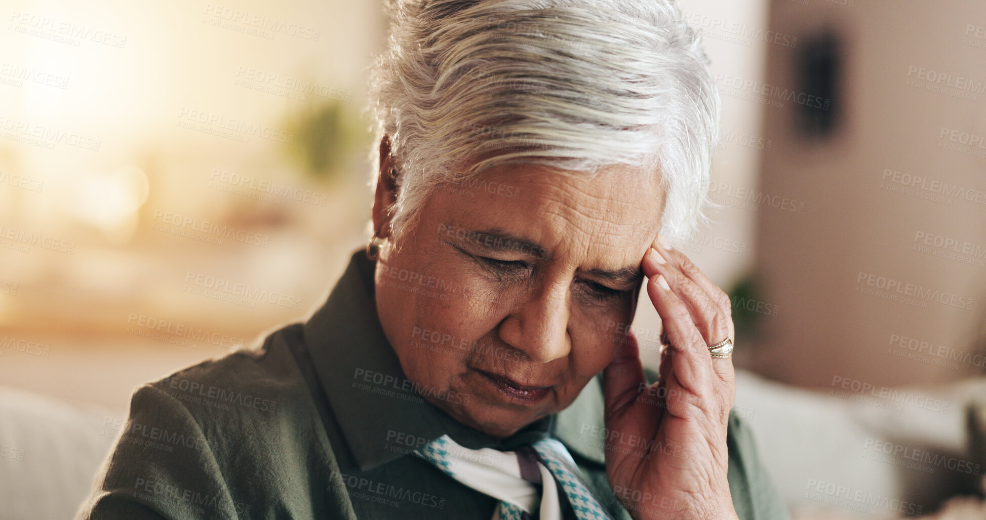 Buy stock photo Retirement, thinking and old woman in house, sad and depression in living room, mental health and sofa. Contemplating, unhappy and mature person with anxiety, sickness and thoughts of senior care