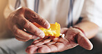 Hands, pills and bottle in closeup for person with drugs, routine and schedule for health in home. Elderly patient, container and pharma product for supplements, wellness or benefits in retirement