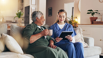 Buy stock photo Nurse, tablet and consultation with senior woman in home with results, news or coffee for medical report on sofa. People. caregiver and digital touchscreen with laugh, healthcare and support with app