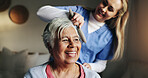 Brush, help and nurse with patient for hair in retirement home at healthcare consultation. Happy, medical checkup and caregiver assisting elderly woman with hairstyle in morning at nursing facility.