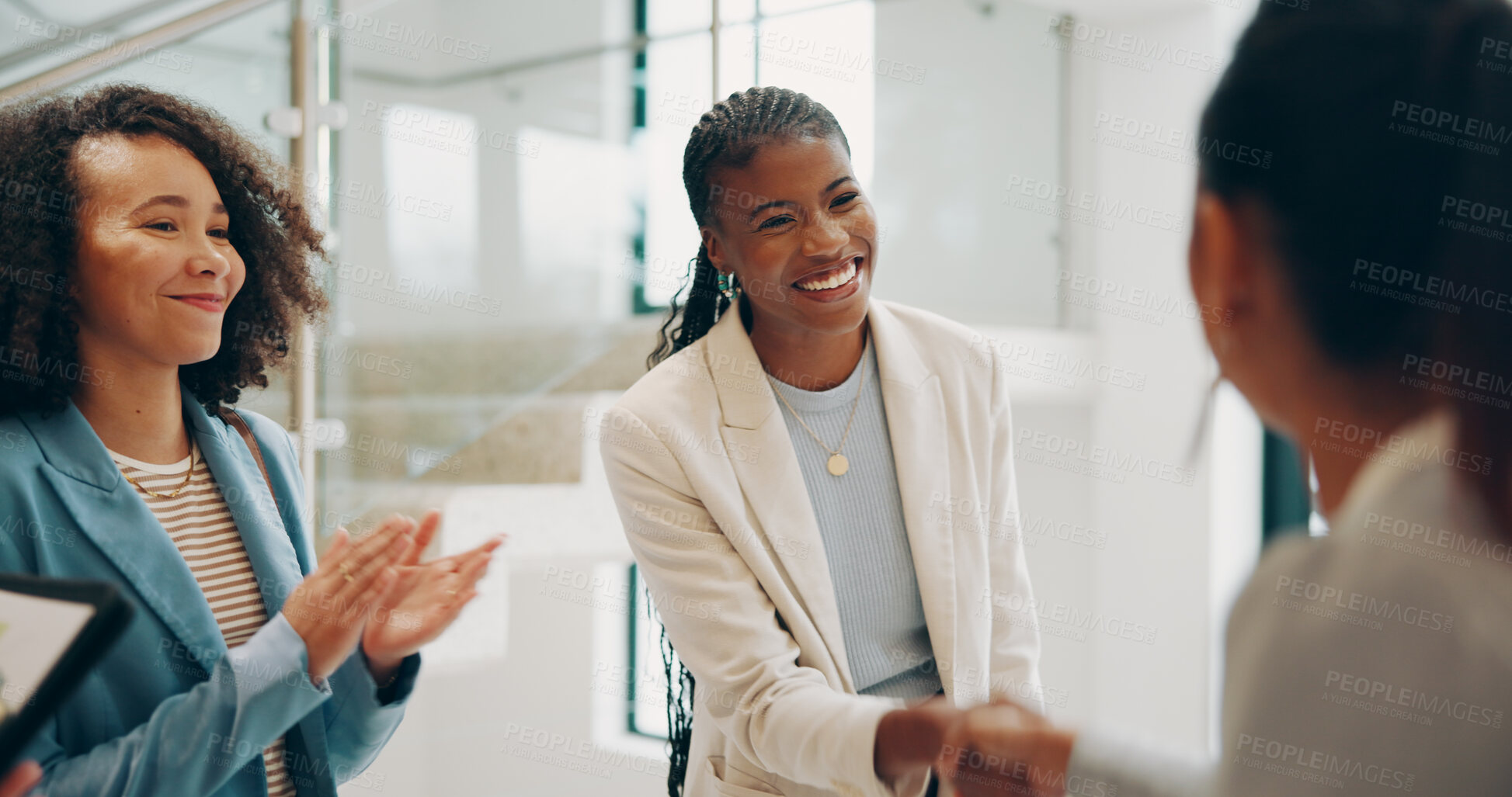 Buy stock photo Business, women and excited at office with handshake for partnership, deal and agreement. People, employees and excited or happy for job well done, promotion and career opportunity on staff meeting