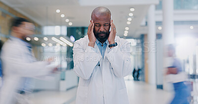 Buy stock photo Doctor, man and headache in hospital with stress of medical mistake, overworked and burnout. Motion blur, black health worker and migraine in busy clinic with fatigue, crisis and frustrated for chaos