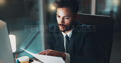 Buy stock photo Computer, night and reading with business man in office for administration or research. Documents, information and report with serious employee in workplace for deadline, overtime or review.