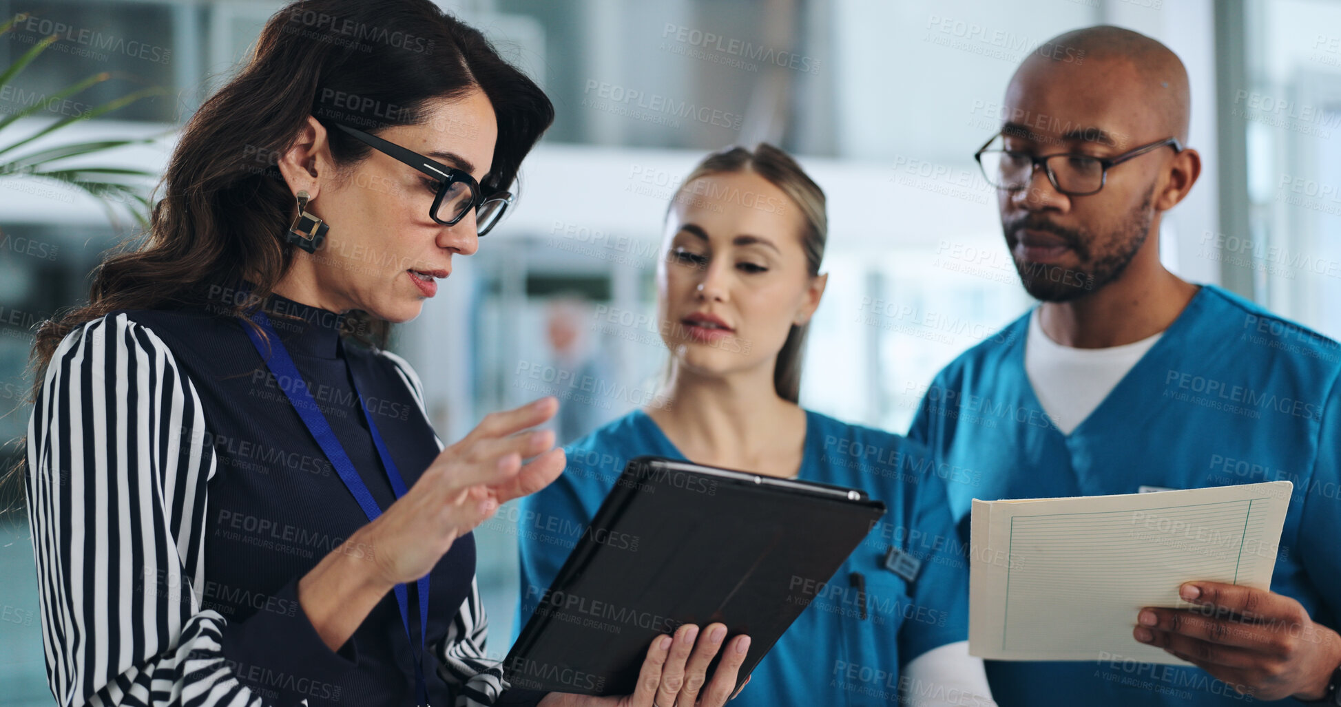 Buy stock photo Medical team, tablet and meeting in clinic for advice, innovation and feedback with patient report. Hospital CEO, people or tech in lobby with results, solution or professional opinion for healthcare