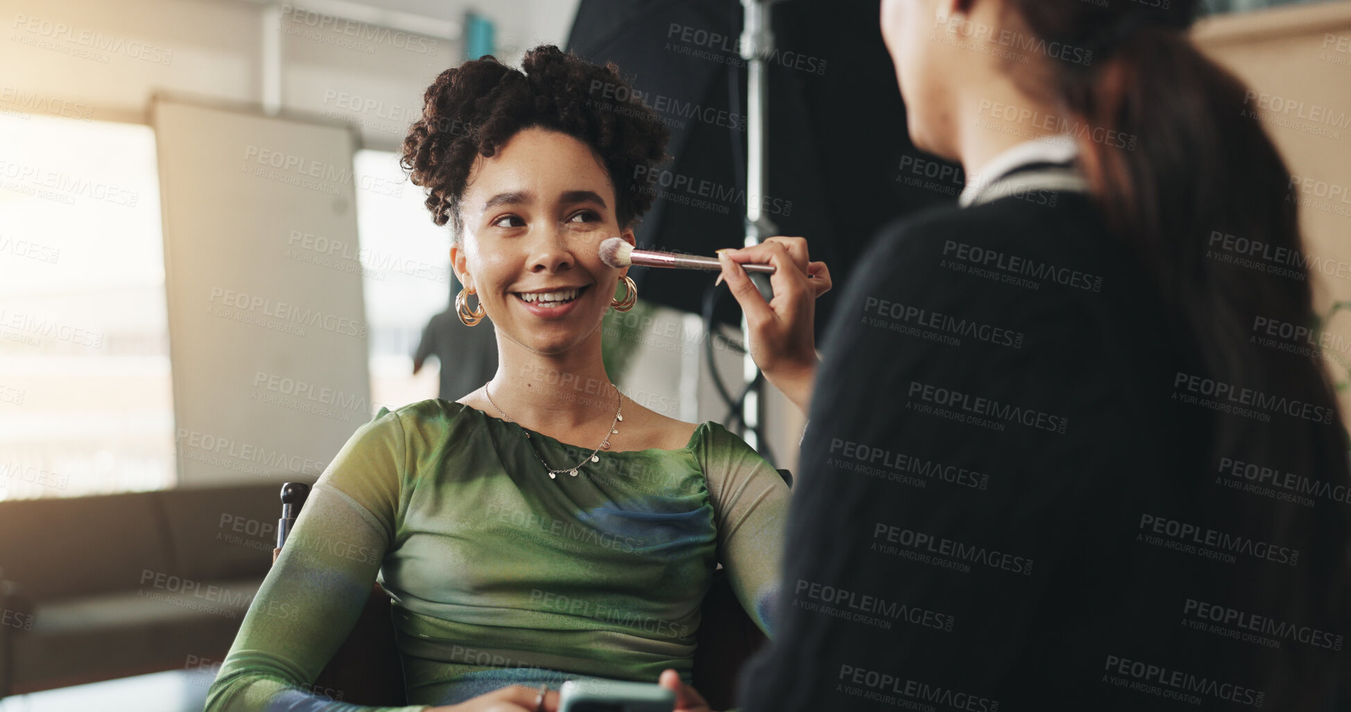 Buy stock photo Smile, studio and makeup for woman, photoshoot and preparing for fashion show, artist and professional. Production, brush and cosmetologist with equipment, behind the scene and creative on set