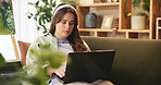 Student, laptop and reading with girl on sofa for research assignment, college thesis and online portal. Education, knowledge and elearning with person at home for university, school and project