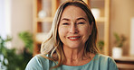 Mature woman, portrait and smile with confidence in home for weekend break in living room. Proud, chilling or face of happy female person in lounge of apartment with positivity in house in Sweden