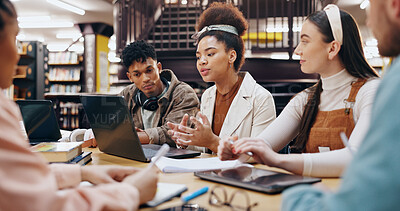 Buy stock photo People, students and laptop in library for discussion, planning and working on research assignment. Study group, exam preparation or tech at university for education, collaboration or course feedback