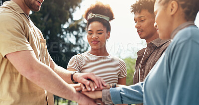 Buy stock photo Students, hands stack and teamwork outdoor with education support, learning success and studying. People, friends and collaboration with college future, scholarship and celebration of synergy goals