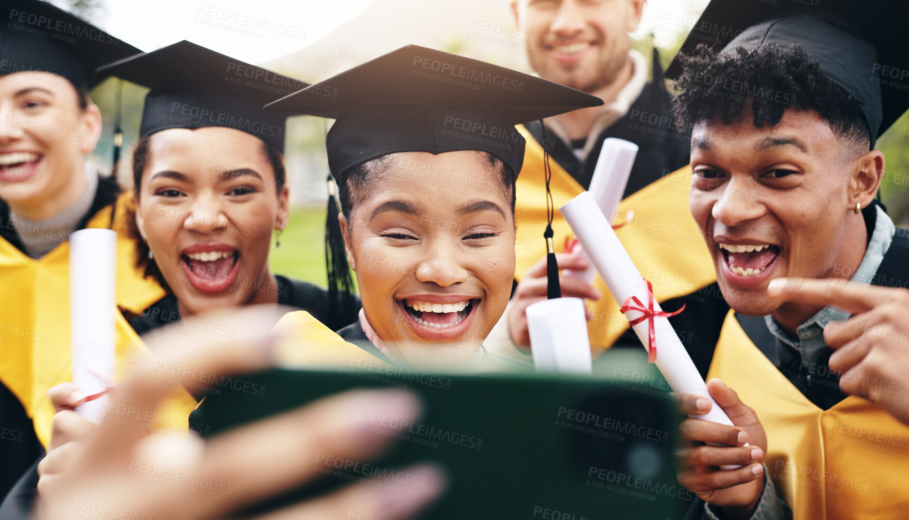 Buy stock photo Selfie, happy and friends at university graduation with degree certificate for education achievement. Excited, diploma and group of students with photography picture for memory of college goals.
