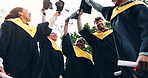 Students, victory and graduation cap in sky on campus with celebration and success People, college and university classmate or friends with smile or happy for qualification, education and achievement