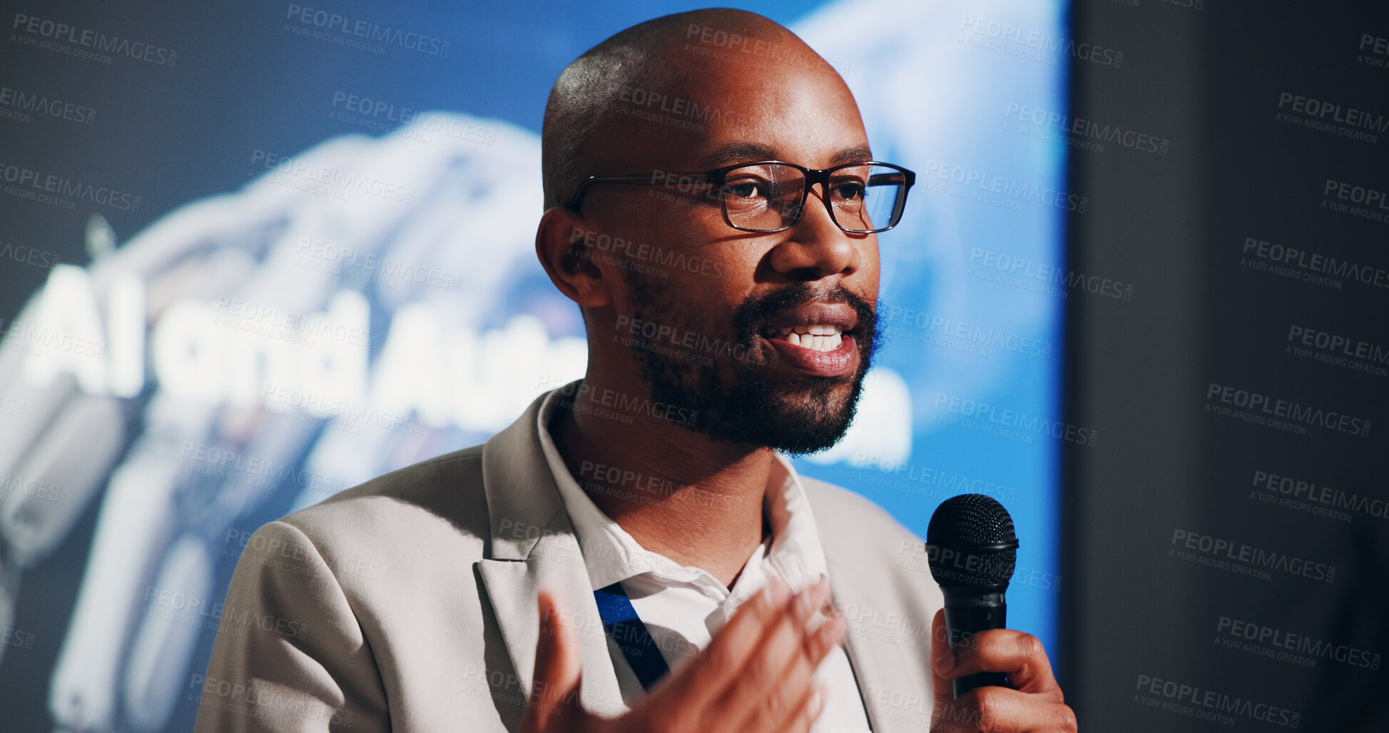 Buy stock photo Black man, speaker and presentation in business seminar for project, machine learning or company. Male person, discussion and AI training for innovation, automation and development with microphone