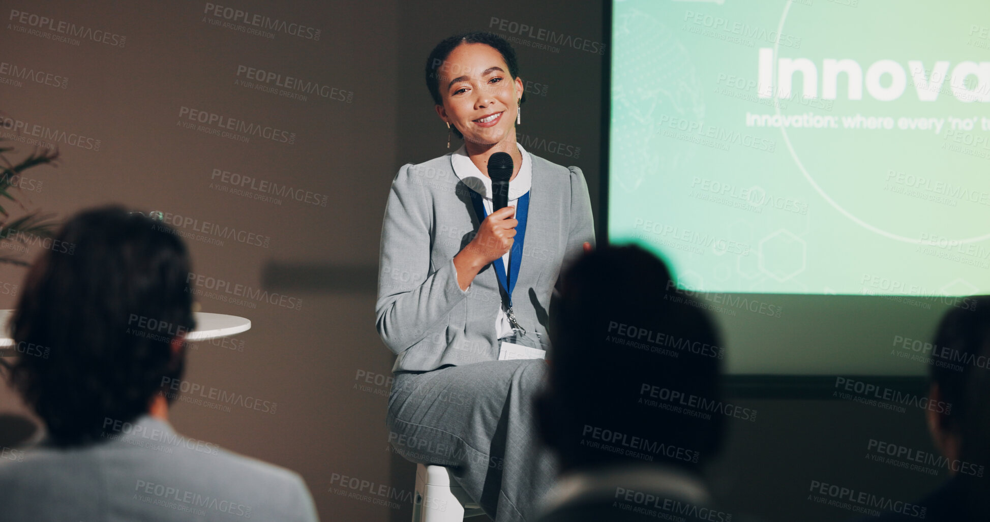 Buy stock photo Woman, stage and happy at conference for innovation and future discussion as public speaker. Female person, screen and presentation for global networking, seminar and summit in auditorium with smile