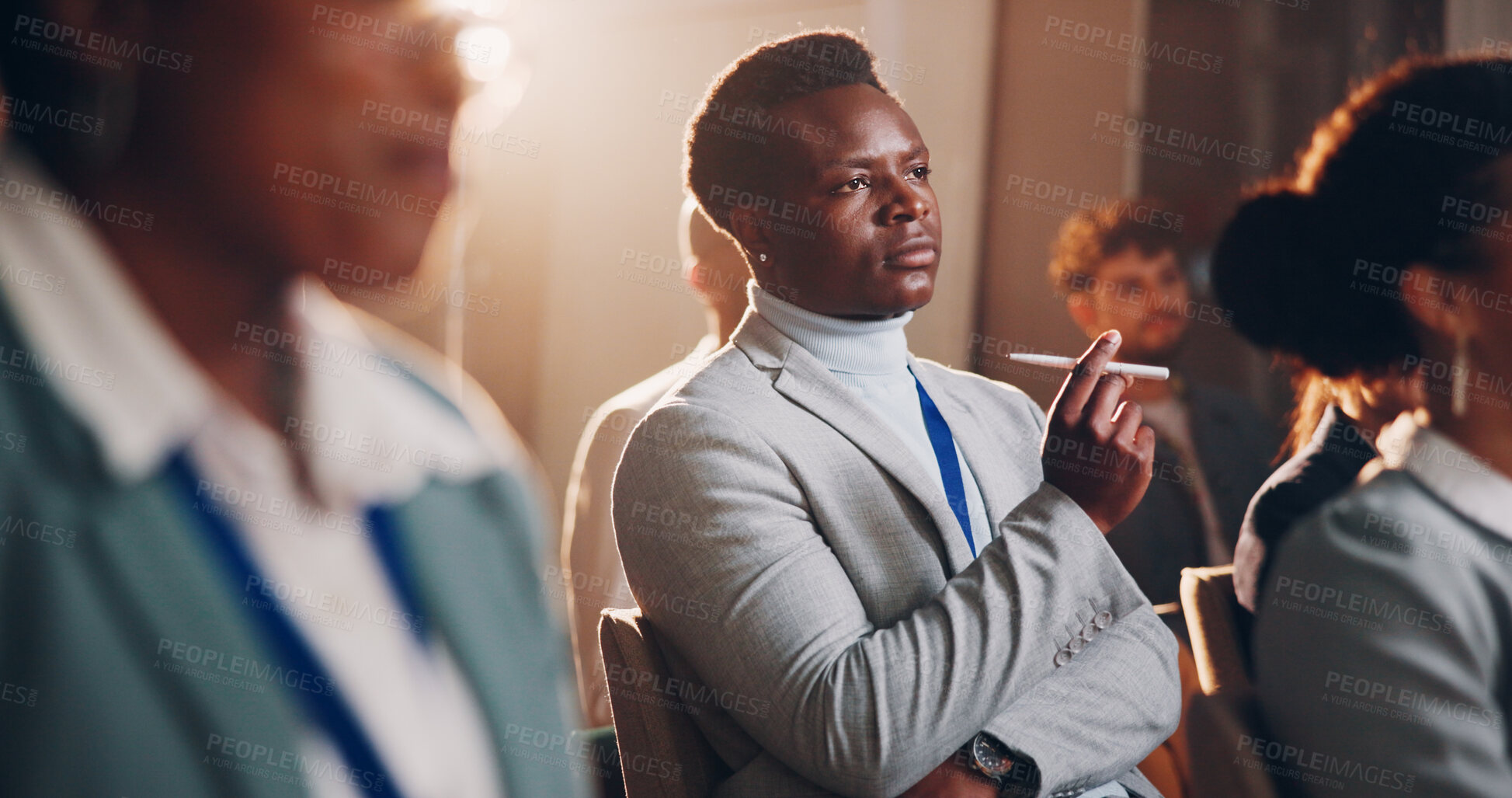 Buy stock photo Business, man and pen with presentation seminar of conference, listening and corporate training for speech. Thinking, male person and crowd with meeting for learning, information and convention event