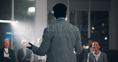 Buy stock photo Back, man and speaker with presentation for crowd speech, workshop and coaching conference on stage. Professional, presenter and mic for communication, public speaking and lecture of business pitch