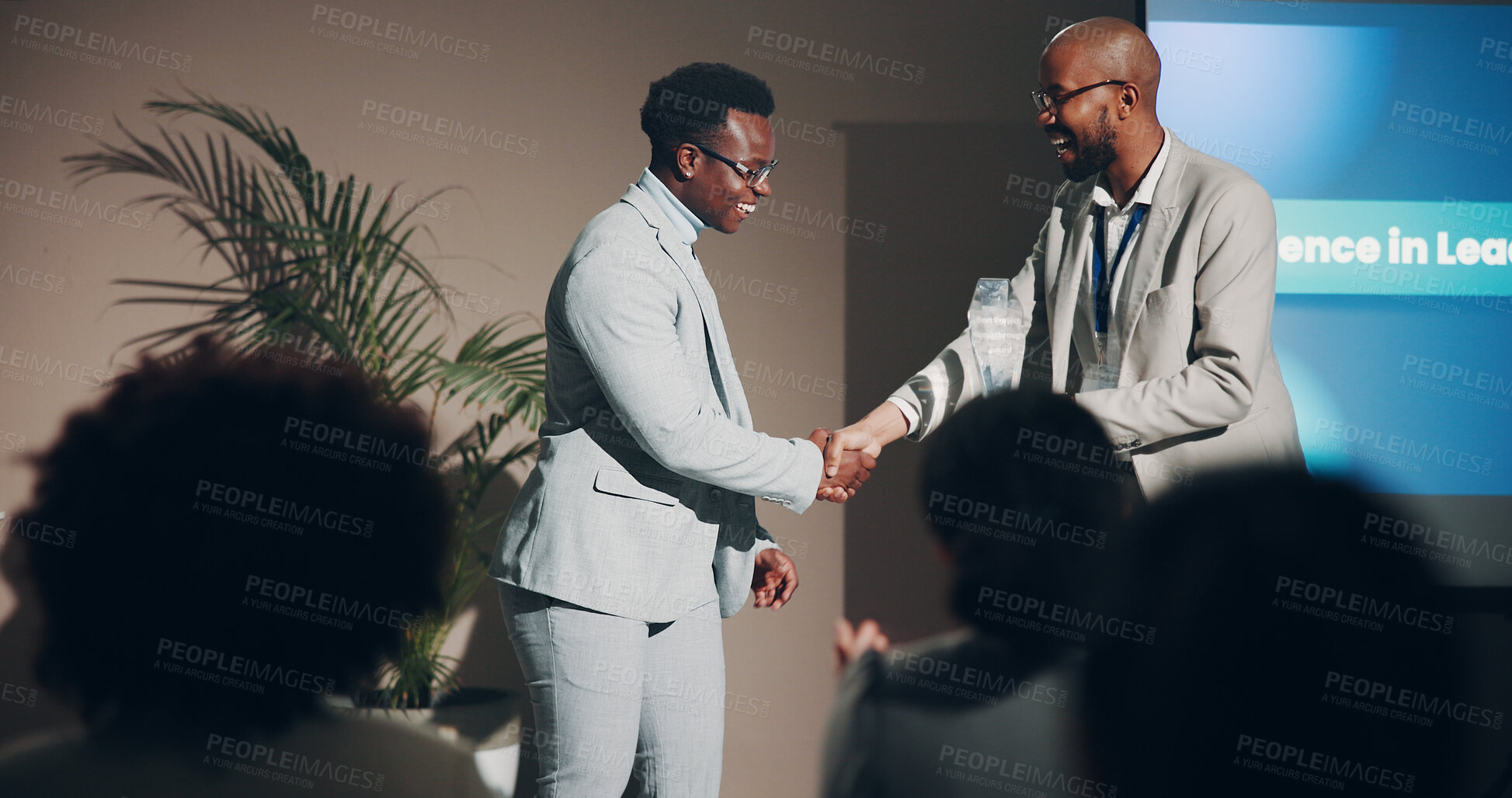 Buy stock photo Handshake, award and smile of men, seminar and congratulations for success, event or corporate. Thank you, professional and celebration of hard work, winning and holding hands for conference or prize