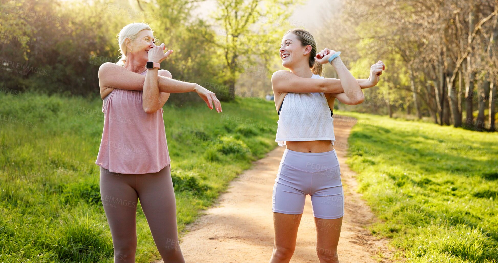 Buy stock photo Fitness, stretching and mother with girl in nature for workout, outdoor exercise and wellness for health. Mature mom, daughter or women in park for training, sports routine or warm up in Australia