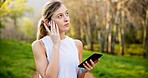 Girl, thinking and phone in nature with fitness for running performance, tracking speed and marathon monitor. Athlete, runner and biometric in forest for wellness progress, music or earphones outdoor