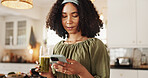 Woman, kitchen and smartphone with green smoothie on social media for posting. Female person, home and healthy diet or nutrition on internet or online for tips on vitamins, supplements or ingredients