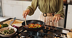 Stirring, frying and hands with spoon, kitchen and meal prep of healthy food, cooking and breakfast in home. Morning, nutritionist and person with vegetables, process and gas stove for heat and pan