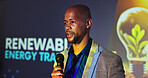 Talk, speaker and black man at seminar with microphone,  presentation and ideas for renewable energy. Climate change, resources and presenter at conference on sustainable power solution on screen